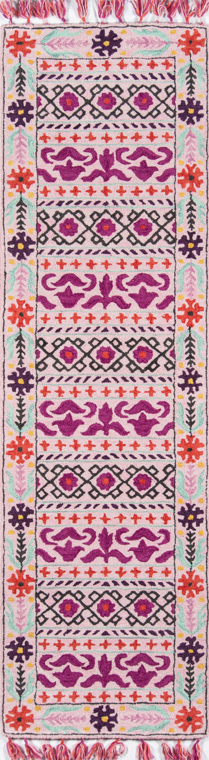 5' x 8' woven area rug in pink, purple, red & teal with geometric & floral motifs; fringed ends.
