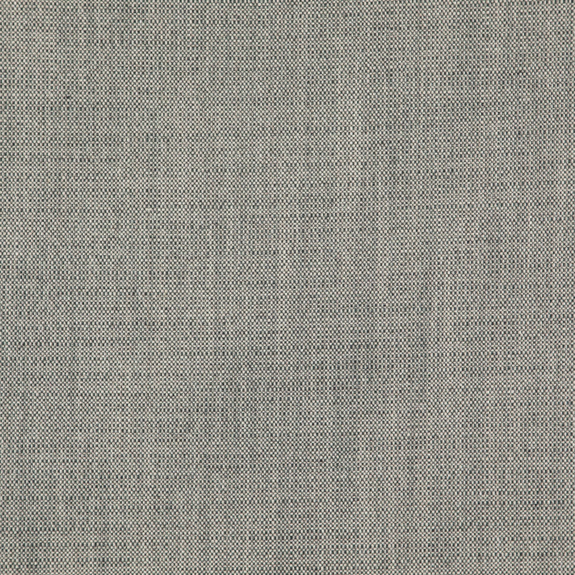 Close-up of grey jacquard fabric with linen texture; upholstery textile for sofas, chairs & cushions.
