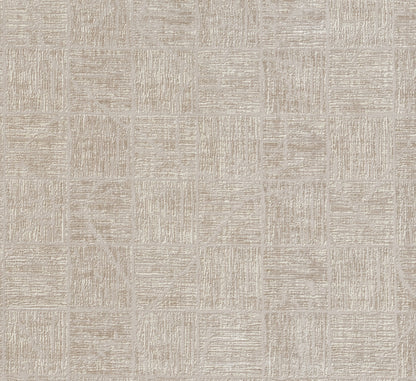 Beige rug with a square patchwork pattern and brushed linear details.