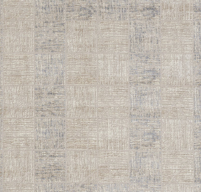 Beige and blue textured area rug with square-tiled geometric pattern; modern, versatile living room decor.