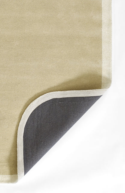 Beige flatweave rug with light gray edge trim; corner turned to reveal dark gray underside.