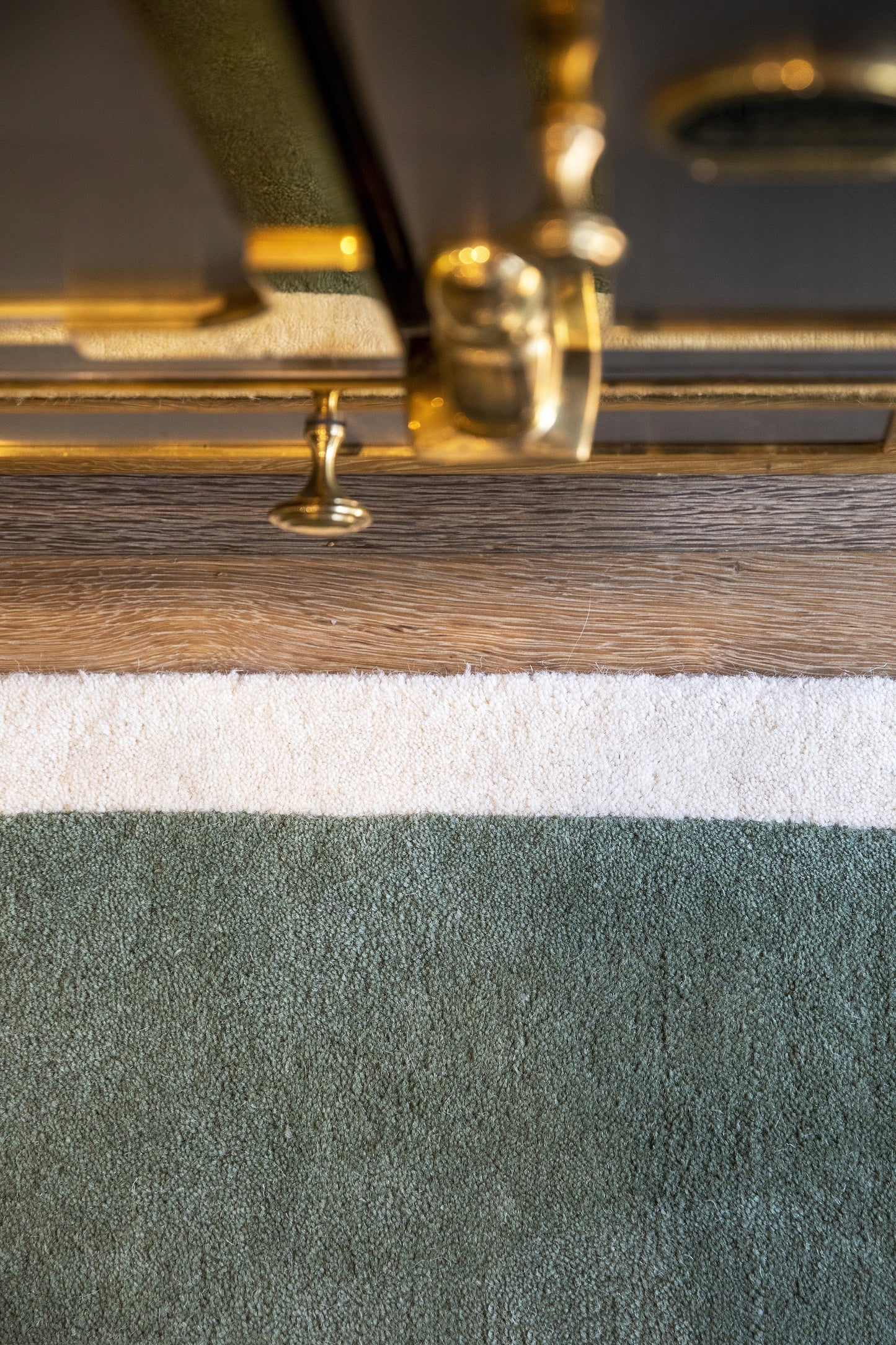 Close-up of a textured rug showing its pile.