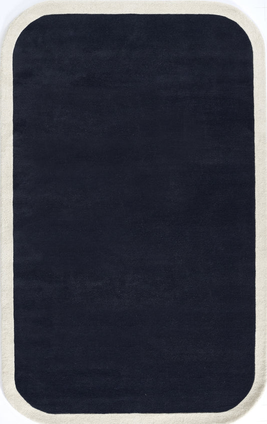 Navy rug with rounded corners and pale beige border; plush surface.