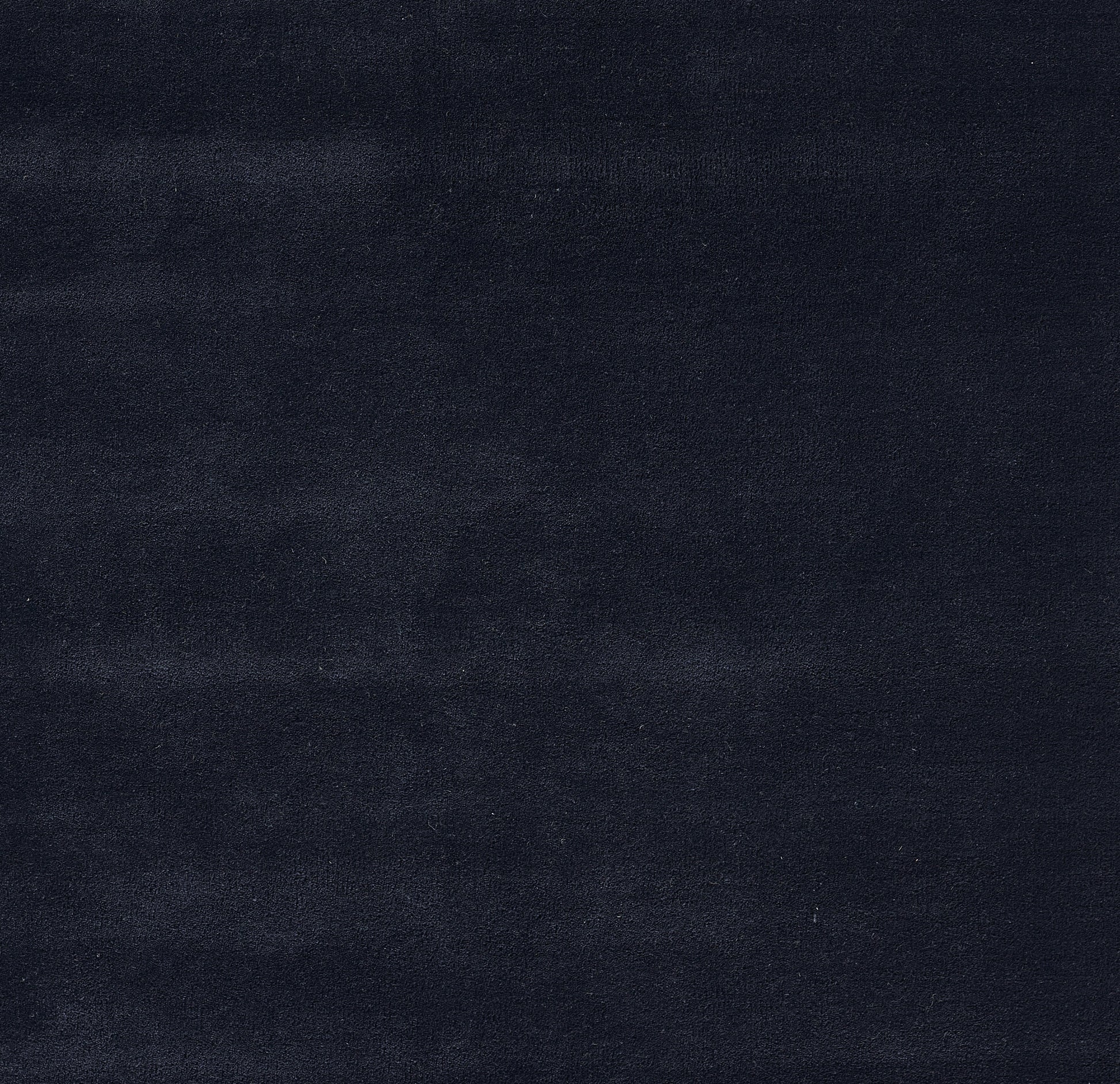 Dark navy velvet fabric texture swatch with plush surface; suitable for upholstery, cushions, or drapery.