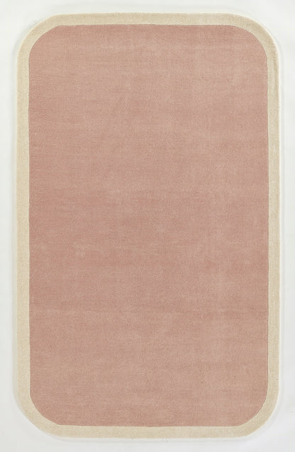 Dusty pink rounded-rectangle area rug with cream border for minimalist home decor.