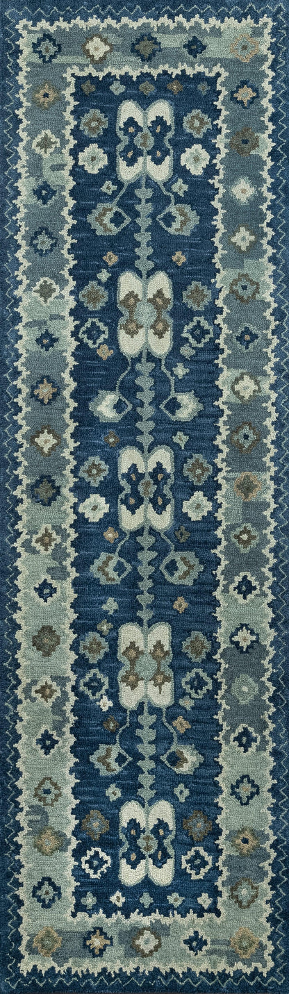 Rectangular blue oriental rug with navy center, cream medallions and pale blue border; intricate floral-geometric motif.
