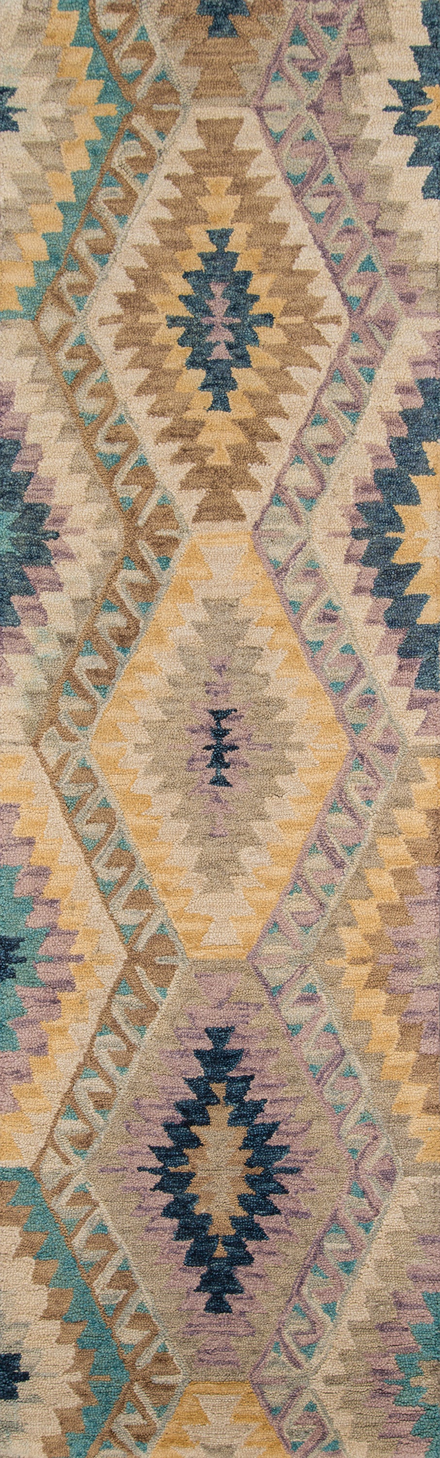 Turkish kilim-style rug with diamond medallions in teal, mustard, beige, lavender; tribal borders and zigzag motifs.