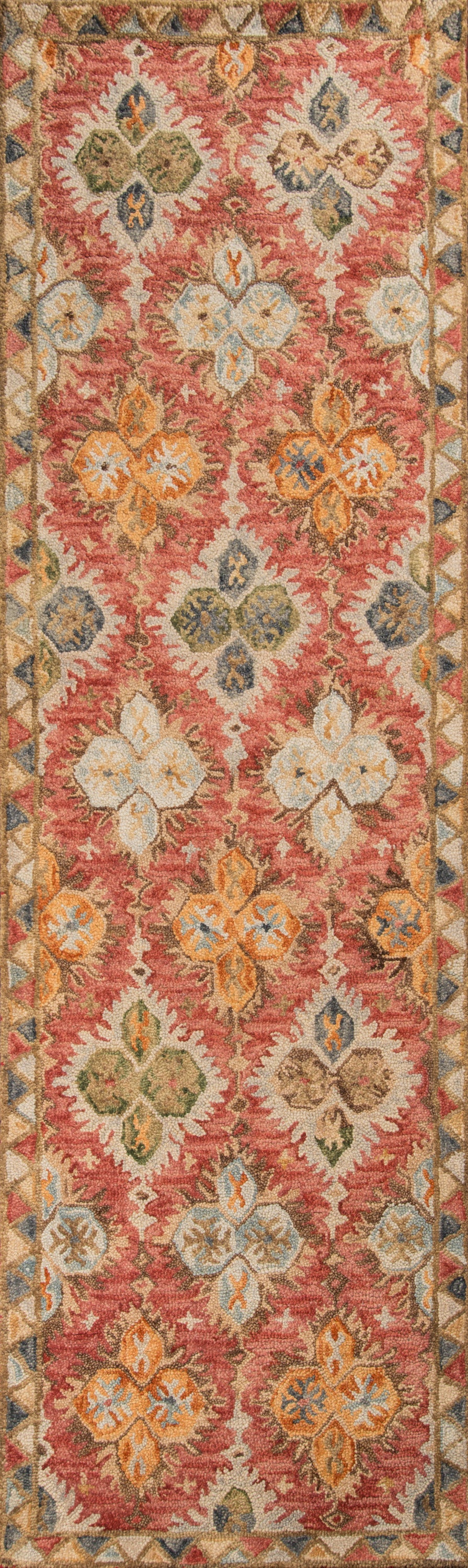 Red Tangitan-style runner rug with ivory, orange and blue floral medallions and a geometric border.