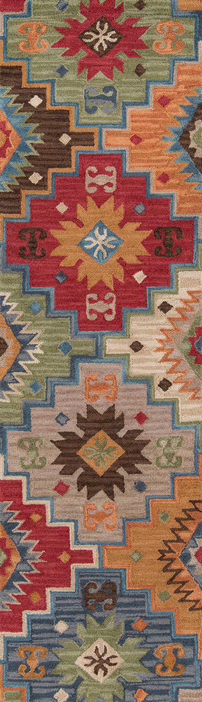Colorful tribal kilim-style rug with stepped diamond medallions and starbursts; borders in red, blue, orange, green.