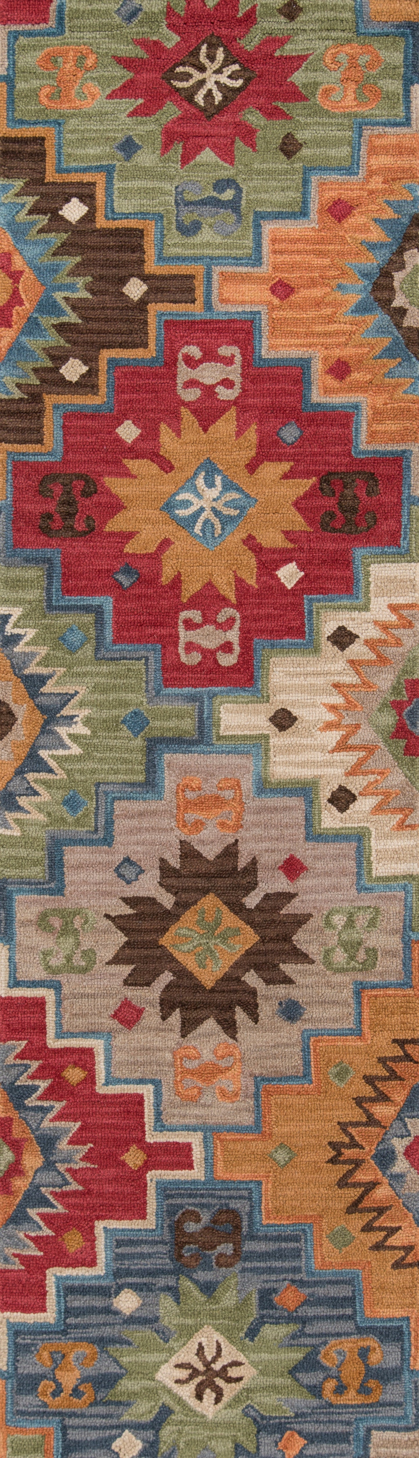 Kilim-style woven rug with bold geometric medallions in red, orange, blue, green and yellow.
