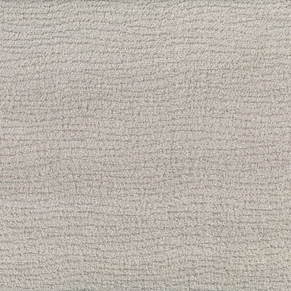 Beige boucle fabric with tight, looped fibers; suitable for upholstery.