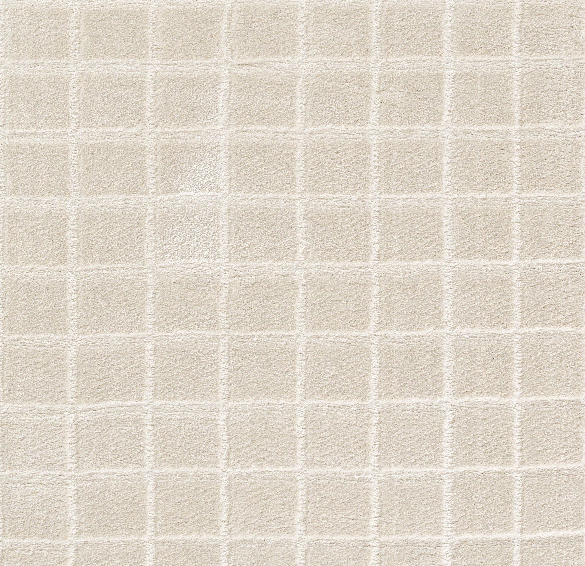 Cream rug with a subtle square-grid pattern.