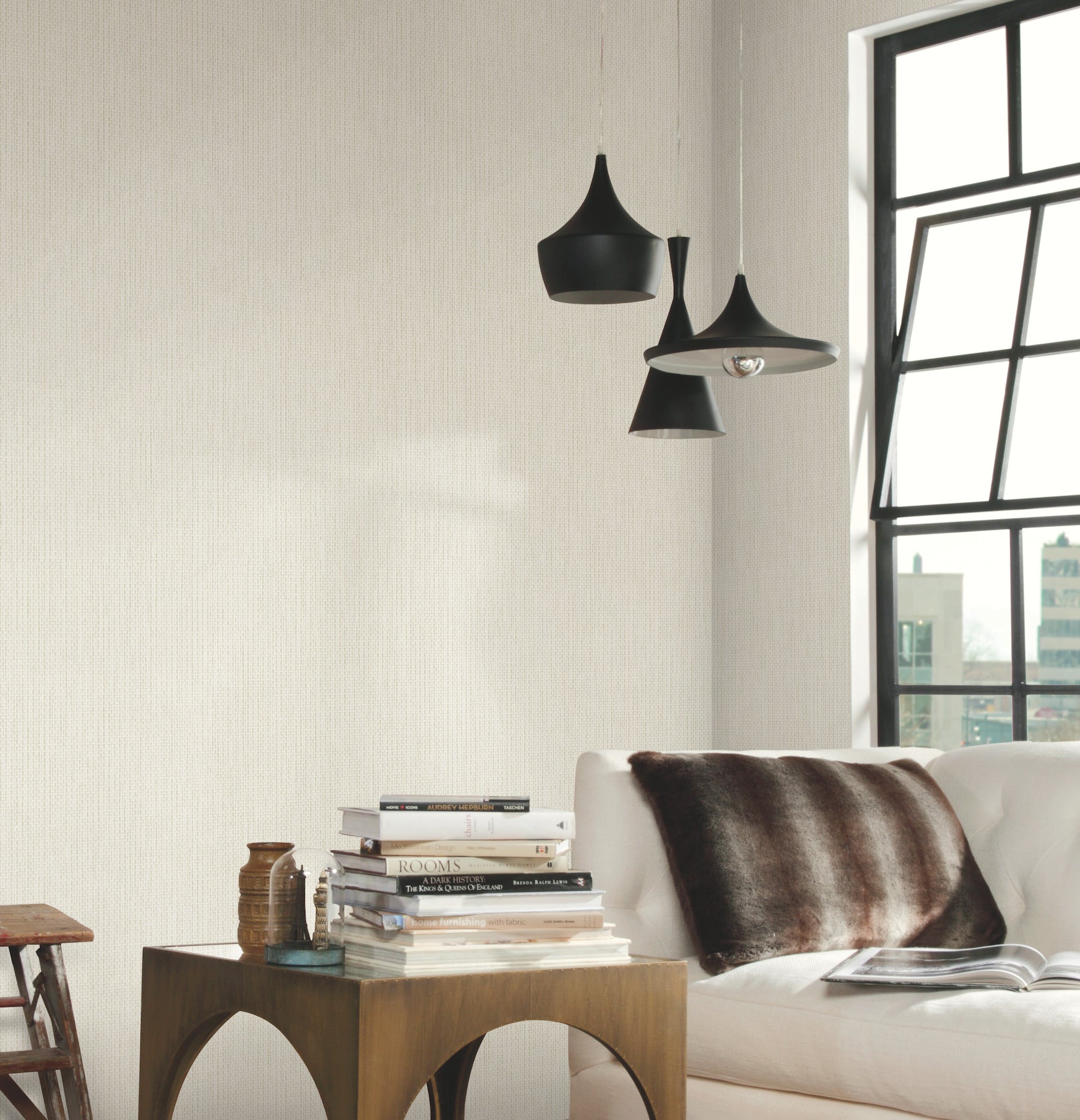 Minimalist room featuring white tile wallpaper with a geometric metro tile pattern in whites and off-whites.