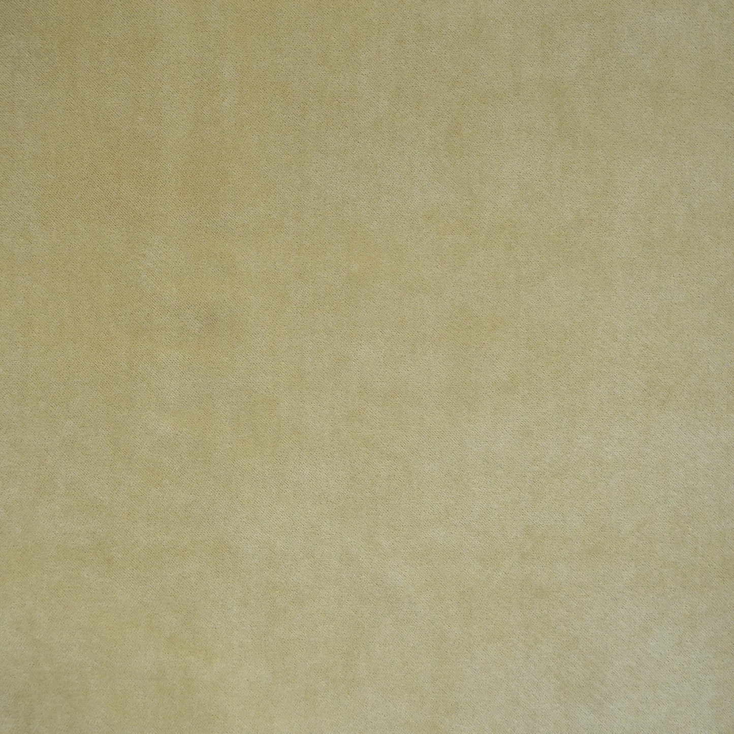 Velvet-textured fabric swatch in creme, beige, yellow and gold, suitable for upholstery or crafts.
