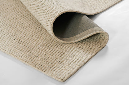 Beige woven jute rug, 5' x 8', with gray non-slip backing and rolled edge showing natural texture.
