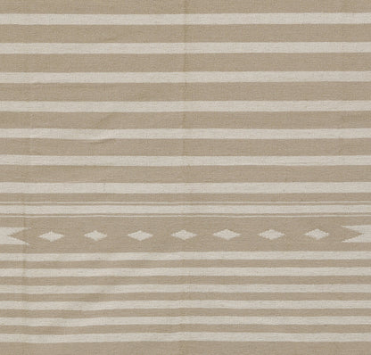 Beige rug with tan horizontal stripes and a central ivory diamond motif band.