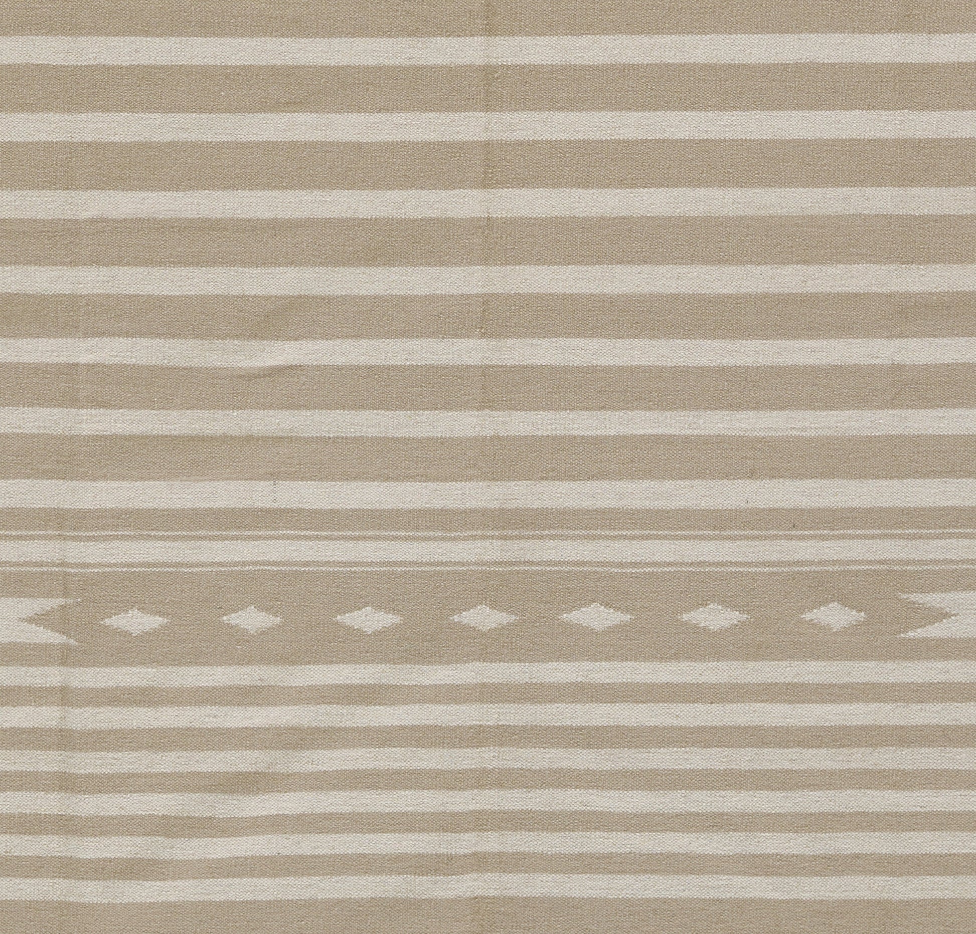 Beige and ivory striped woven rug with a central diamond-pattern band; neutral decor rug.