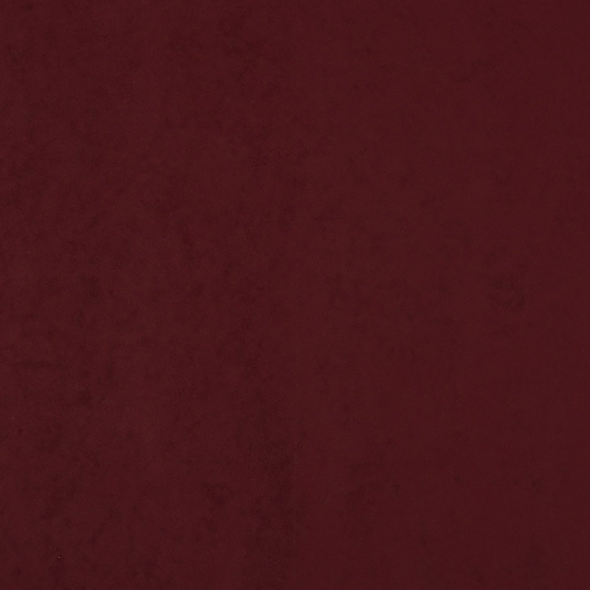 Rich burgundy faux suede fabric with a soft nap and subtle texture.