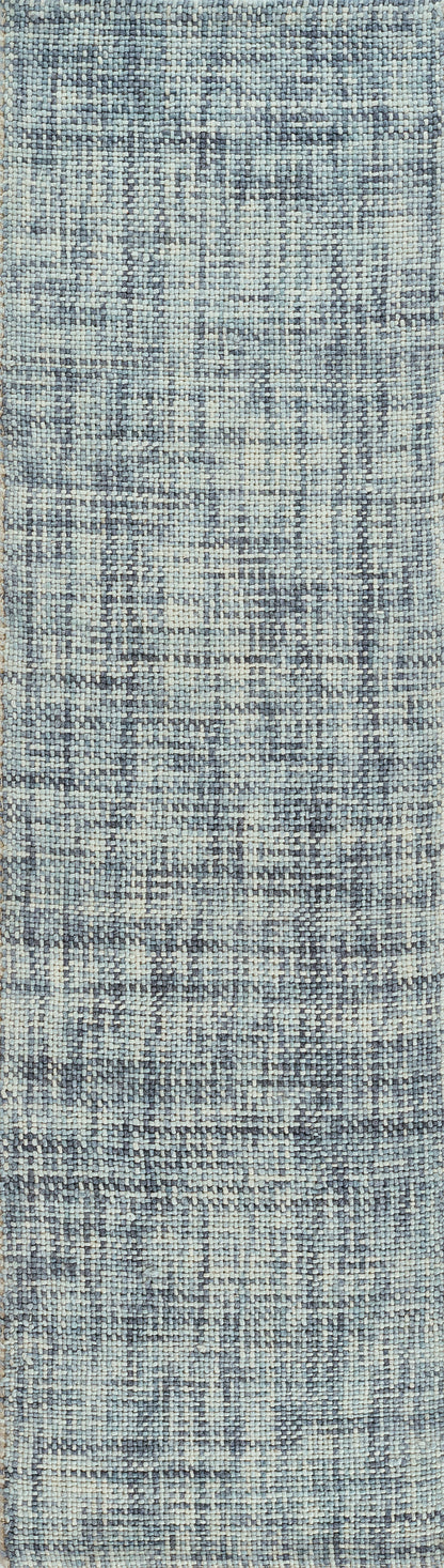 Blue-gray distressed woven runner rug with faded geometric medallion pattern.