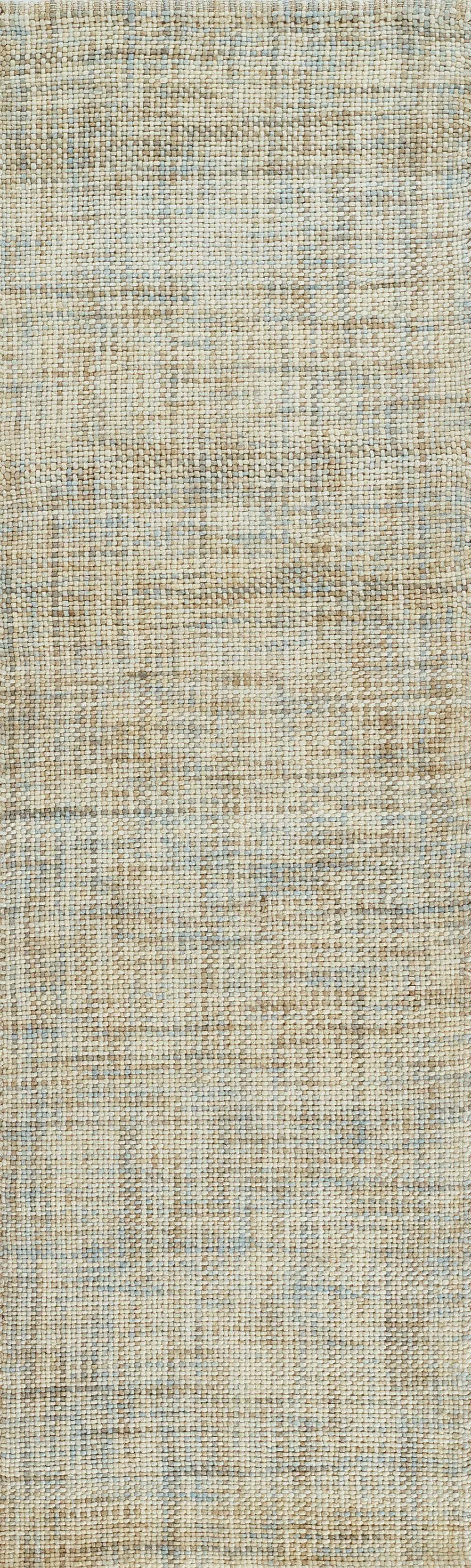 Neutral beige and pale blue flatwoven rug with textured weave and vintage distressed pattern.
