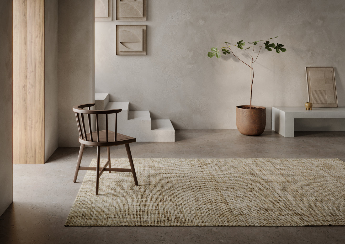 Natural wood Windsor chair on a beige textured rug in a minimalist room with a potted plant and concrete walls