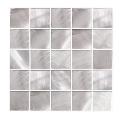Pearl gray wallpaper with a square mosaic pattern reminiscent of small glass tiles and an iridescent brushed finish.