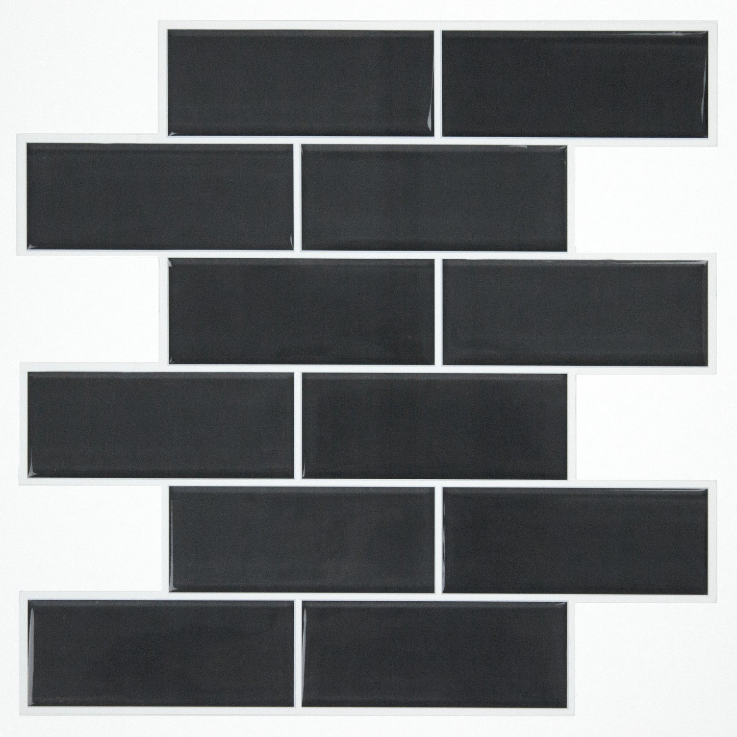 Dark charcoal sticktile wallpaper with a brick-like pattern on a wall.