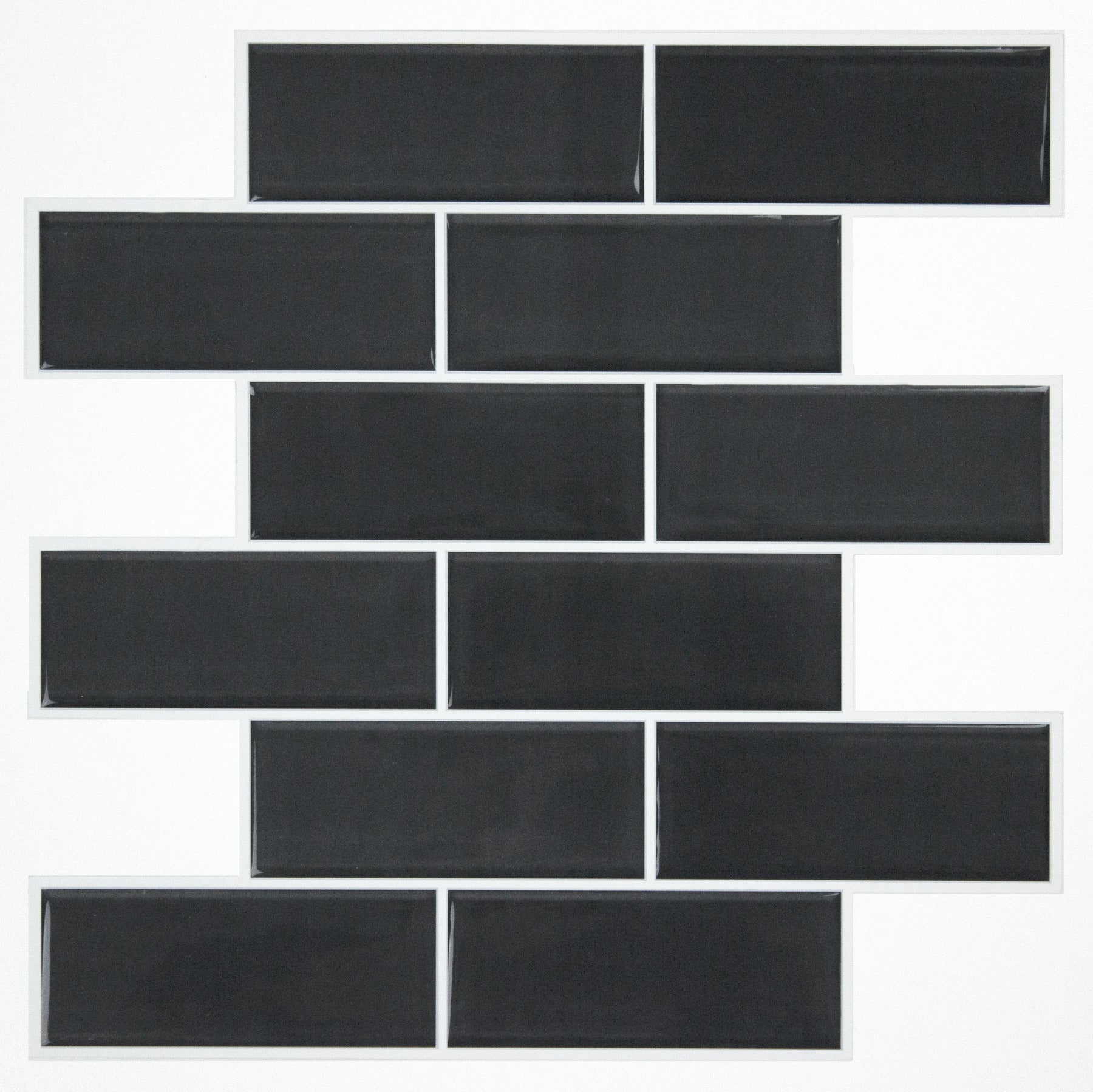 Dark charcoal sticktile wallpaper with a brick-like pattern on a wall.