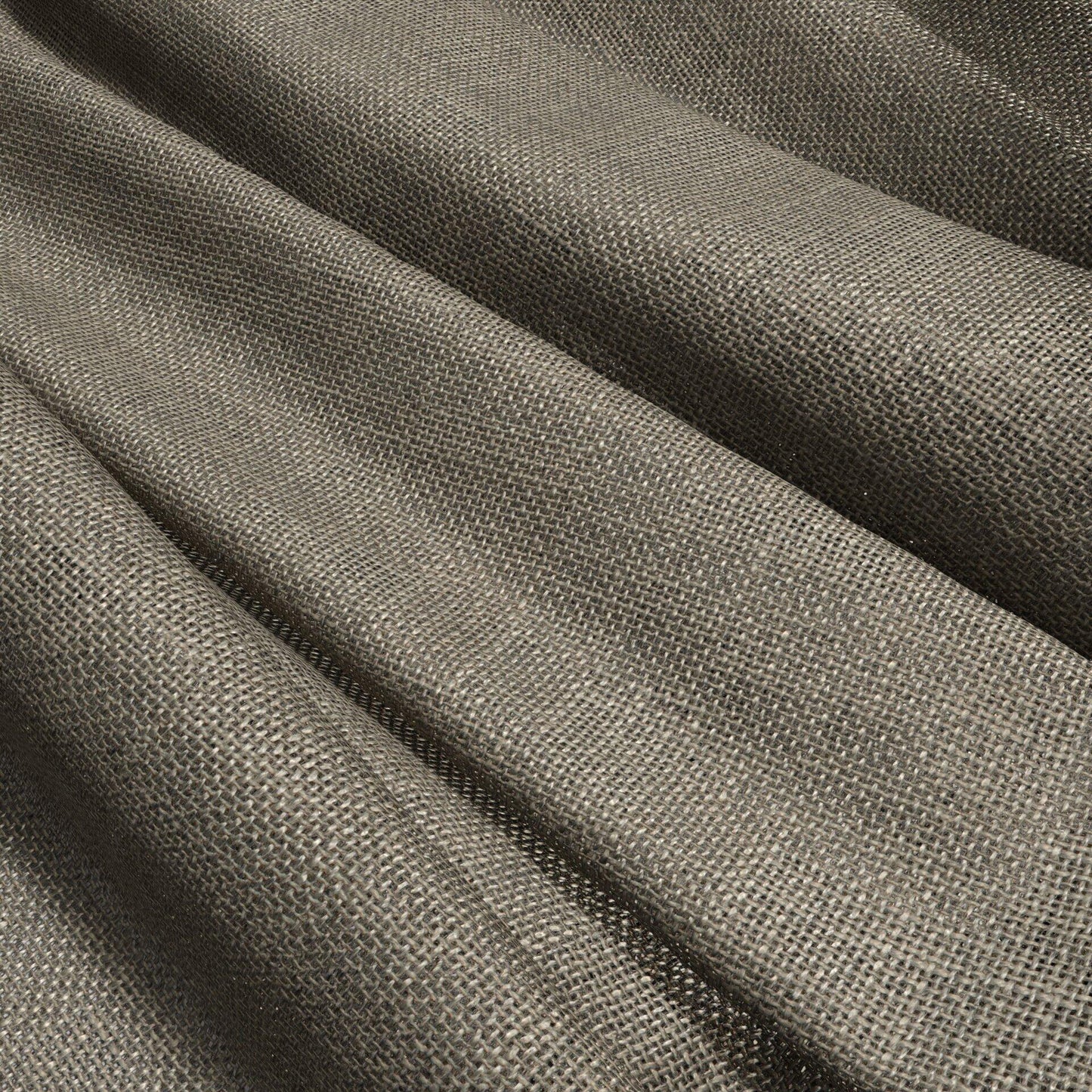 Taupe-brown woven fabric with textured weave and soft draped folds; upholstery or curtain fabric.