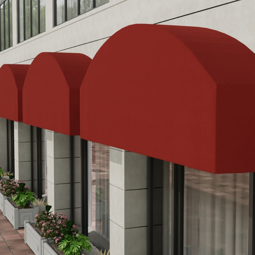 Row of red curved fabric awnings over storefronts on a city sidewalk with planters.