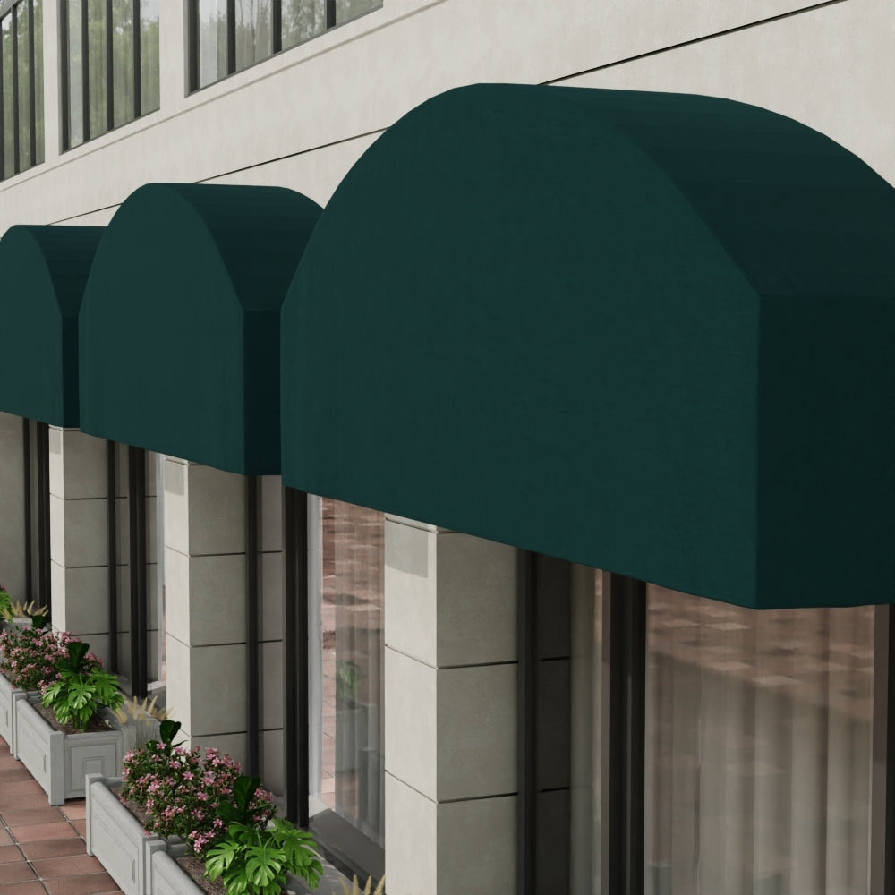 Dark green curved fabric storefront awnings over windows on a beige building; planter boxes line the sidewalk.
