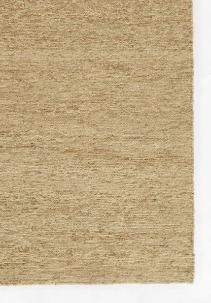 Natural beige jute rug with textured woven fibers; rectangular, rustic coastal style.