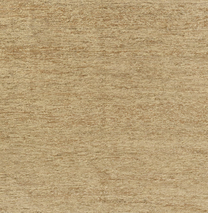 Natural light-brown woven rug with a soft texture on a warm surface.