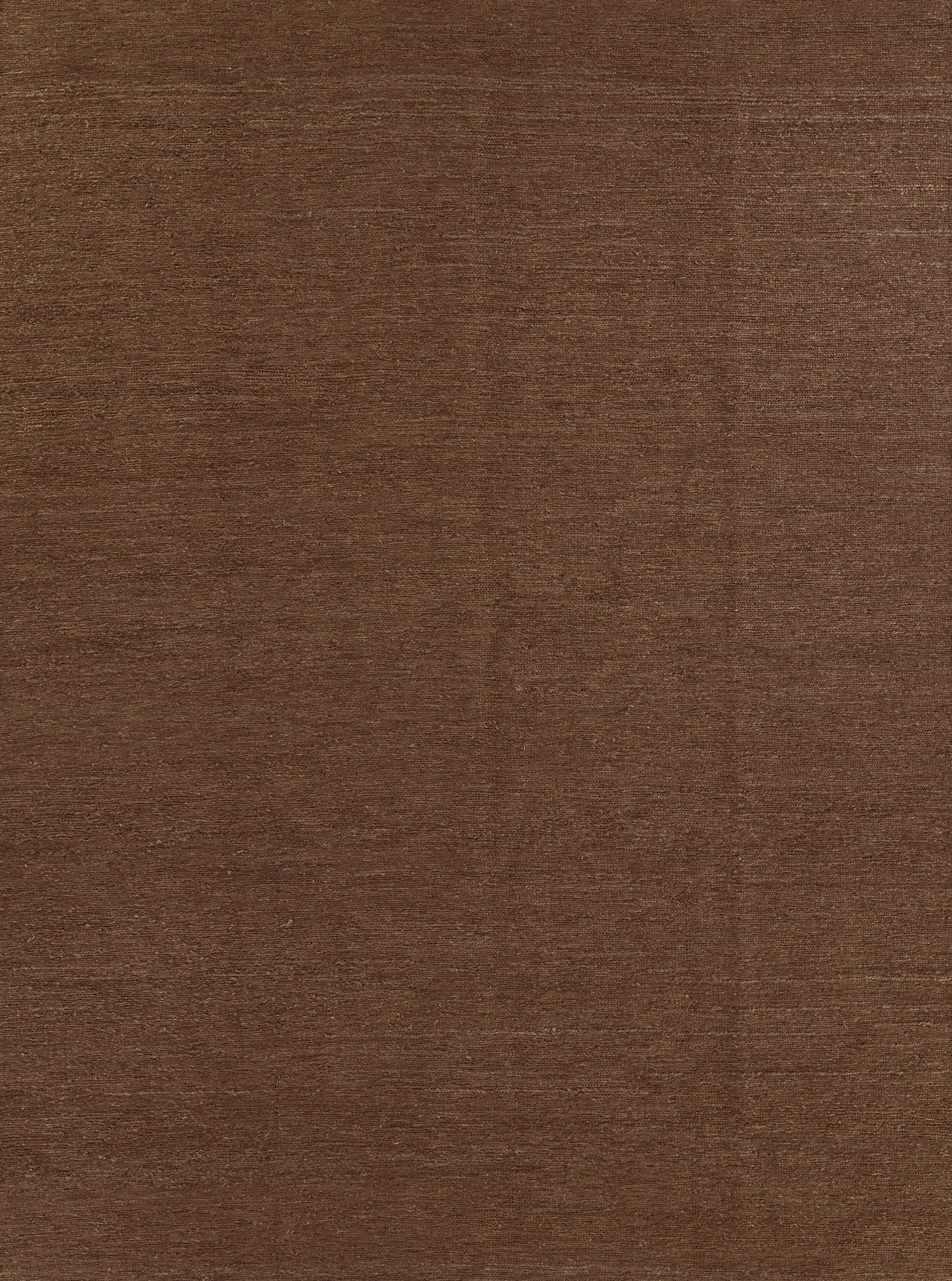 Walnut wood veneer texture in warm brown with subtle grain patterns and smooth finish.