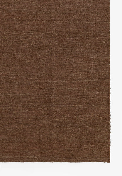 Solid brown rectangular rug with subtle woven texture; warm, versatile floor decor.