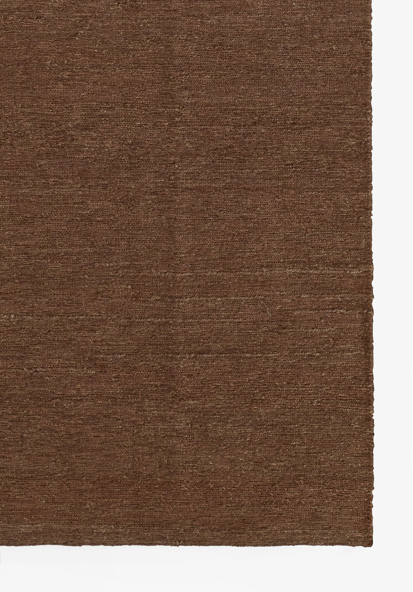 Brown woven rug with subtle horizontal tonal bands; rectangular natural wool texture, cozy versatile living room decor.