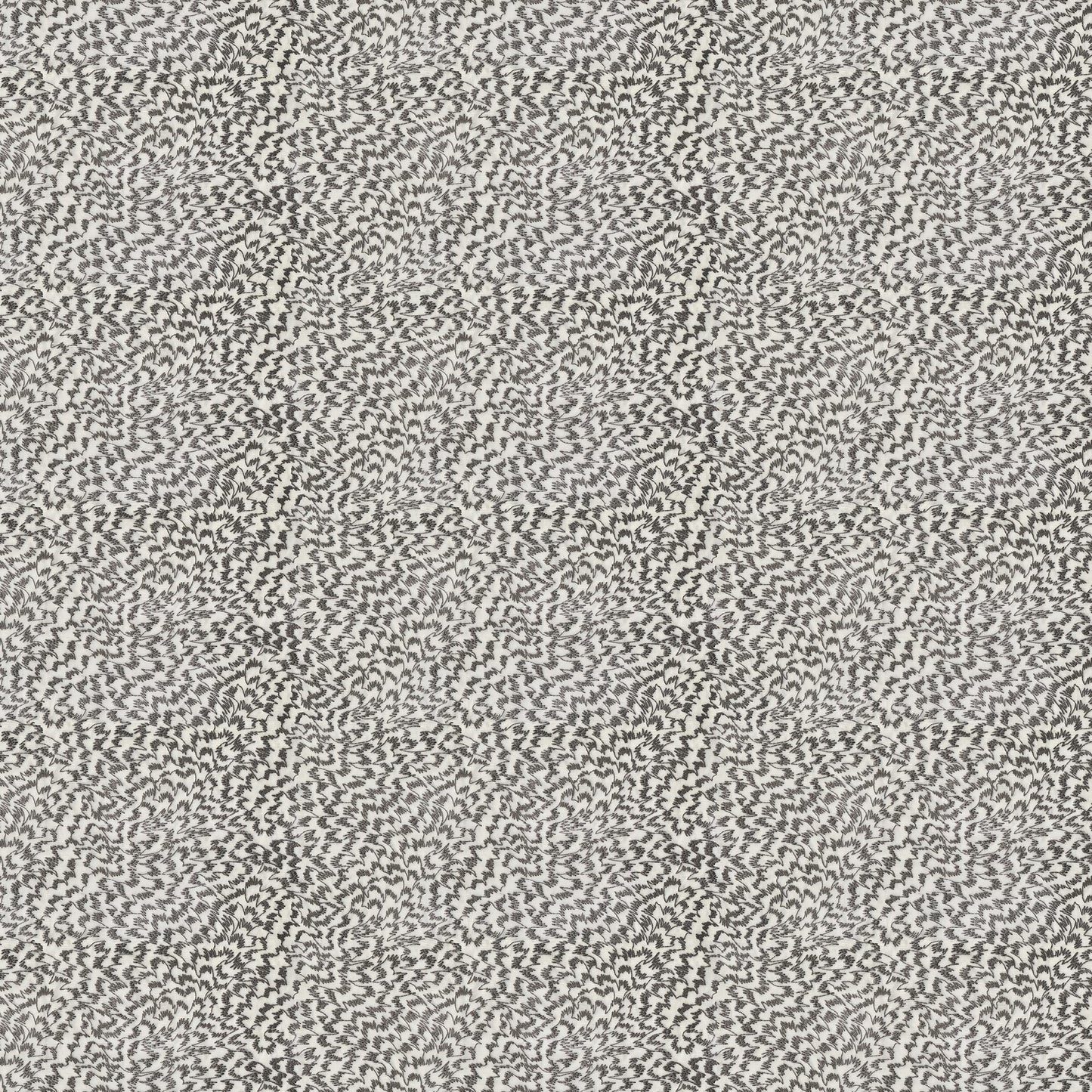 Neutral beige and gray speckled fabric with a dense tiny abstract zigzag pattern and soft knit-like texture.