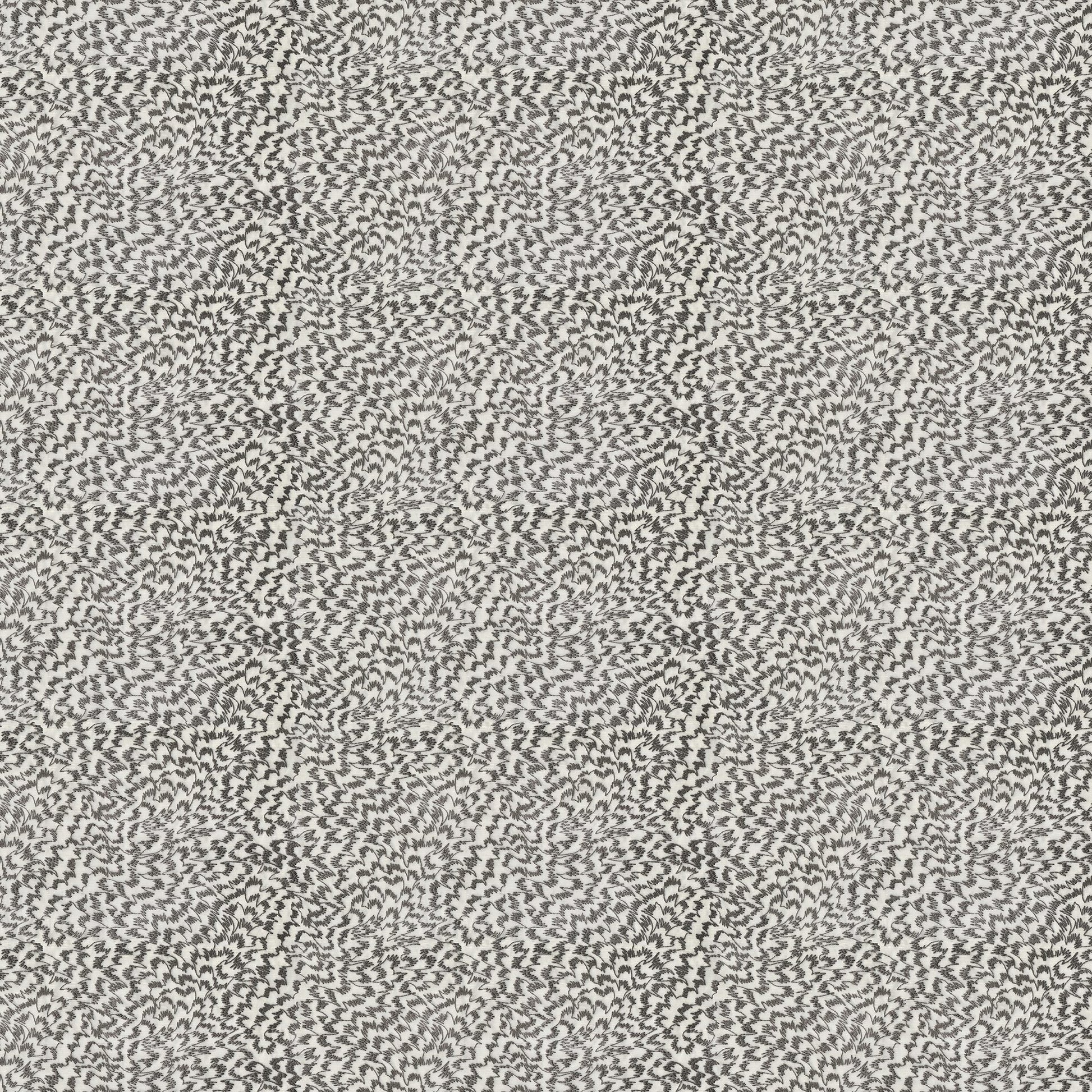 Neutral beige and gray speckled fabric with a dense tiny abstract zigzag pattern and soft knit-like texture.