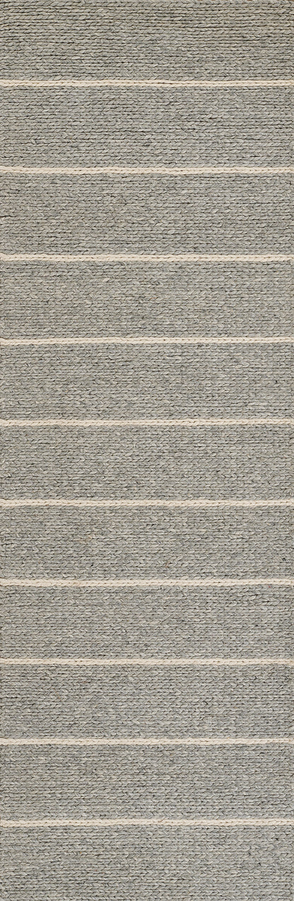 Gray braided rug with cream horizontal stripes & a textured woven surface.