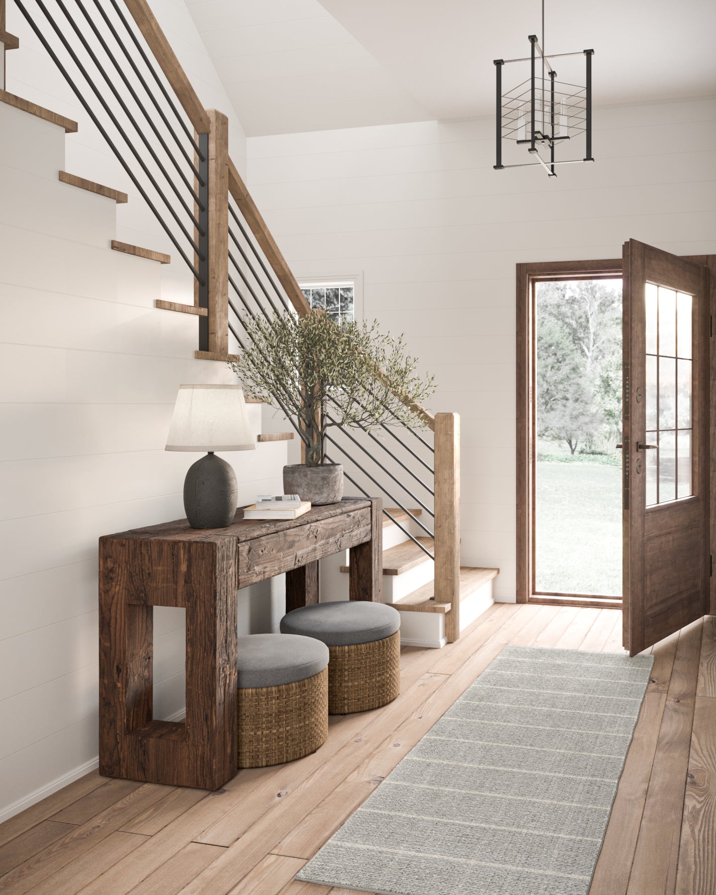 Gray woven rug, 9' x 12', in a neutral entryway.
