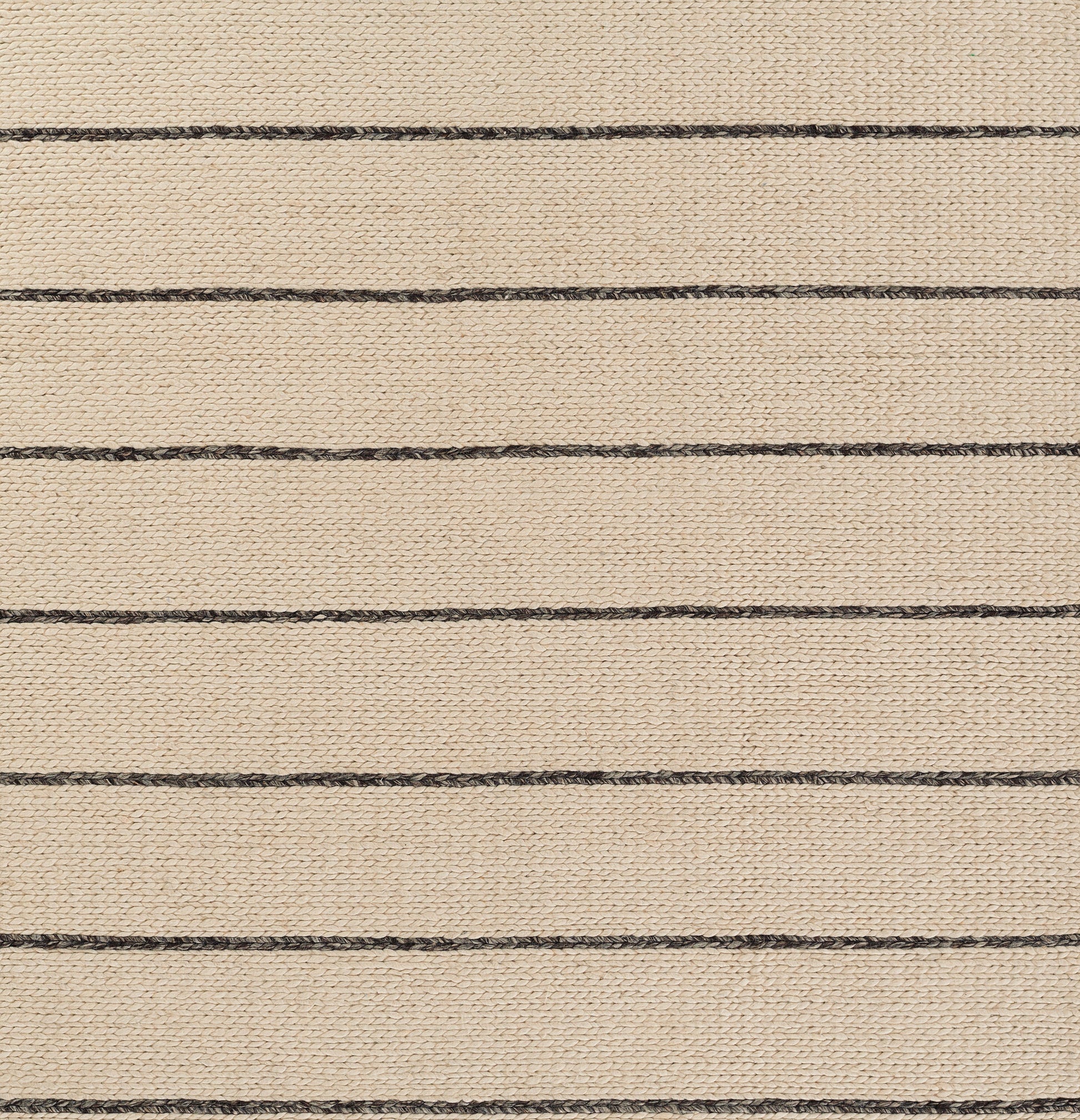 Beige woven rug with parallel dark brown stripes; textured jute-like natural fibers.