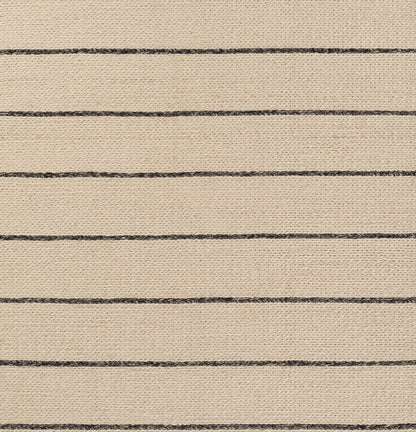 Beige woven rug with parallel dark brown stripes; textured jute-like natural fibers.