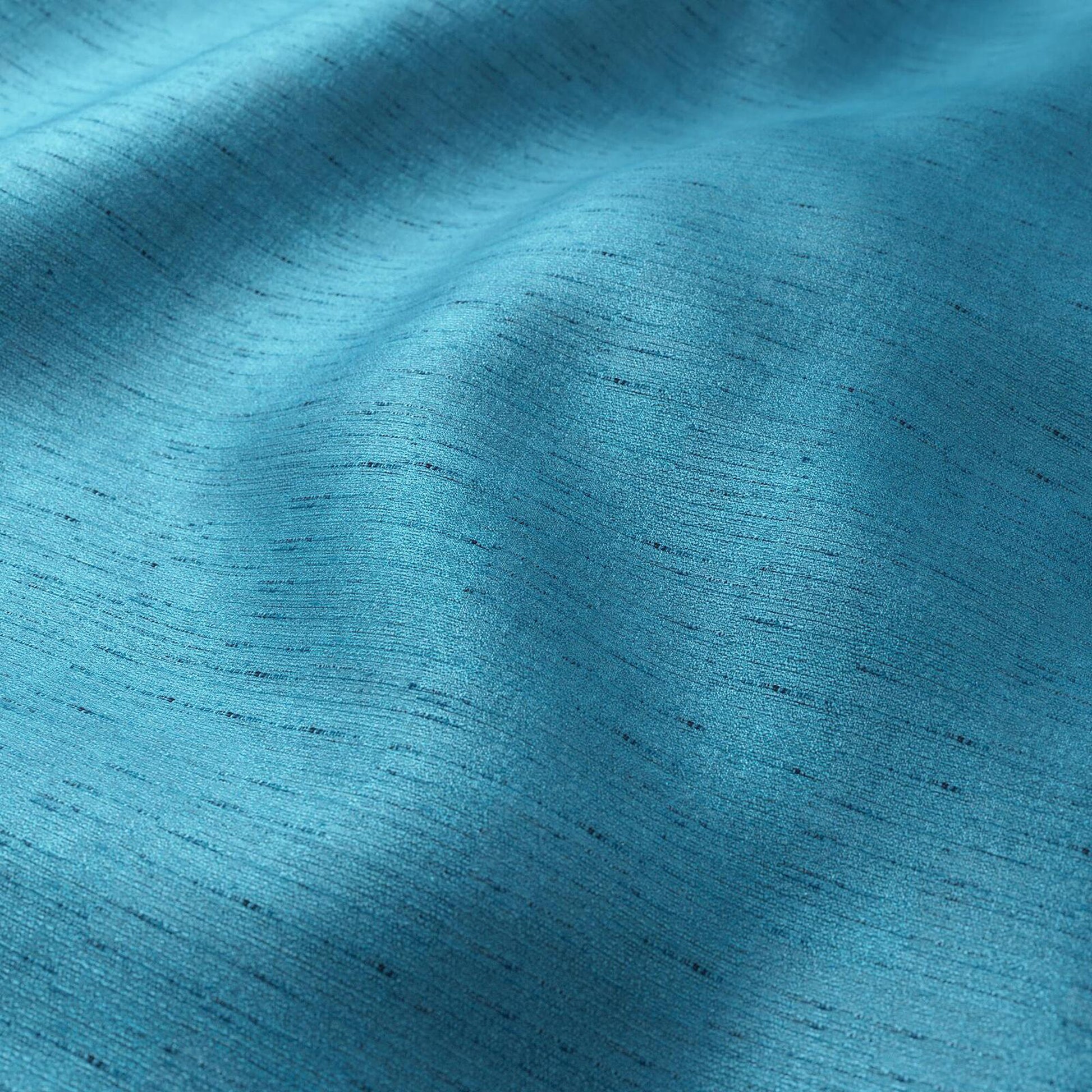 Crepe fabric with blue aqua strie texture and soft drape.