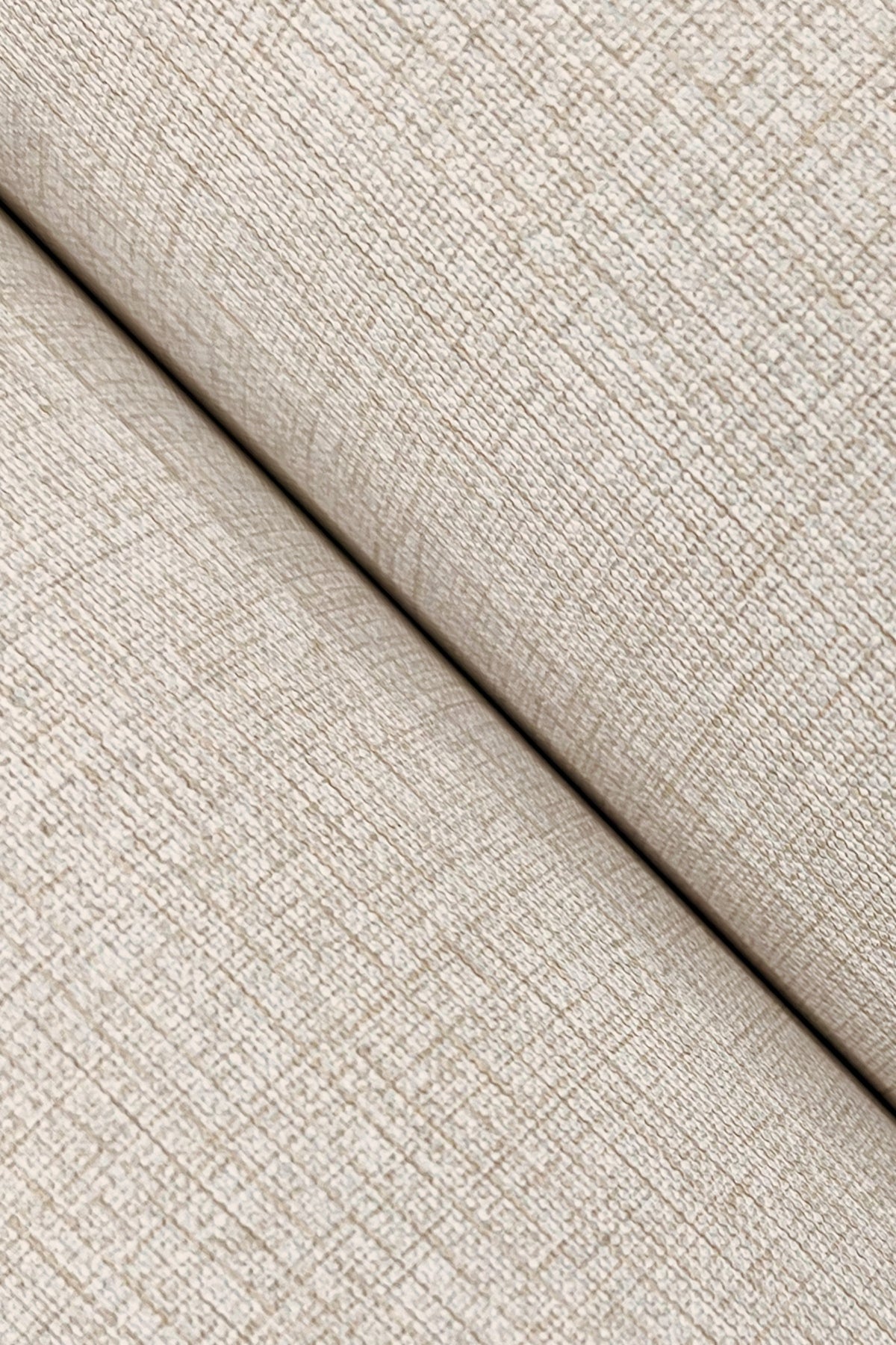 Beige wallpaper close-up showing linen-textured weave with a crosshatch pattern and visible seam.