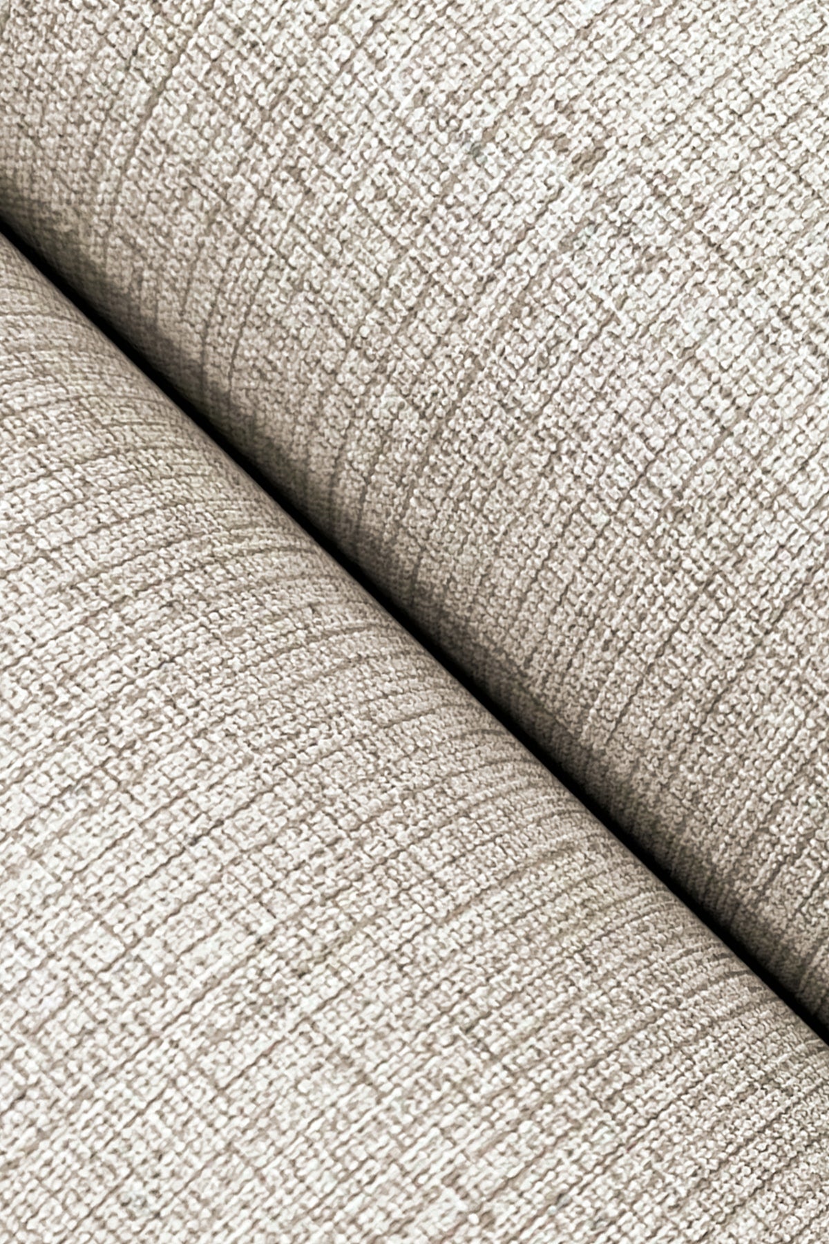 Grey linen-textured wallpaper with a subtle woven grid pattern.
