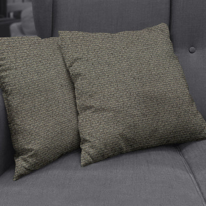 Two square olive-brown textured cushions on a charcoal grey sofa in mocha solid fabric.
