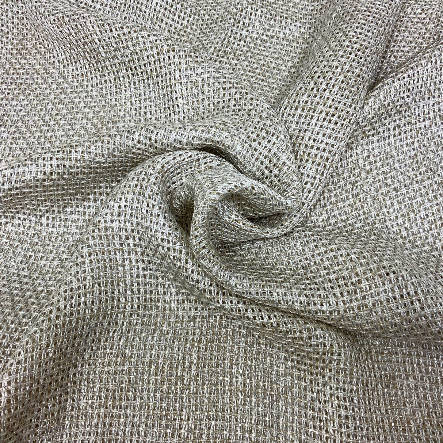 Neutral beige open-weave fabric with a square grid texture, linen-like and softly draped.