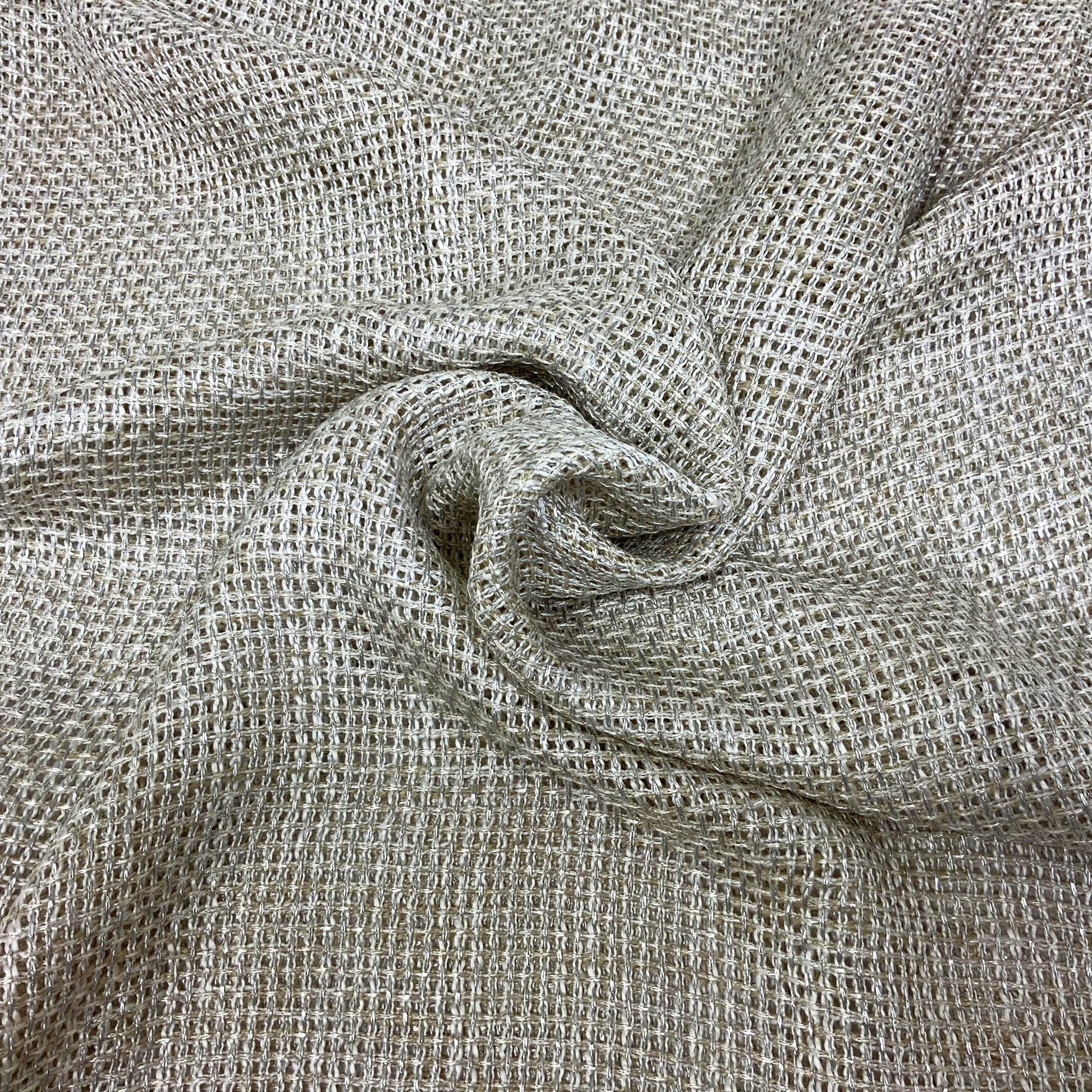 Neutral beige open-weave fabric with a square grid texture, linen-like and softly draped.