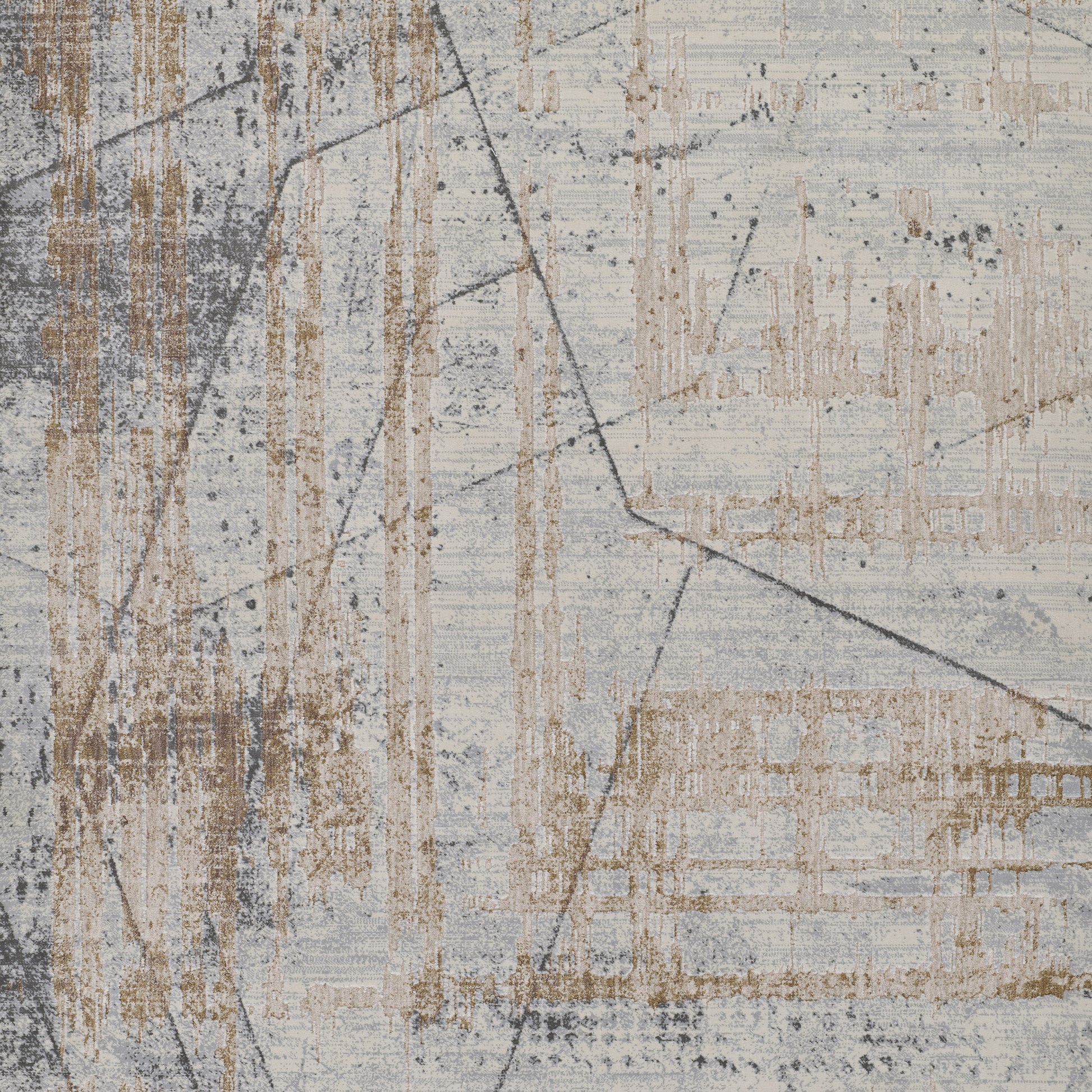 Abstract geometric area rug in blue-gray with tan-beige markings and charcoal lines.