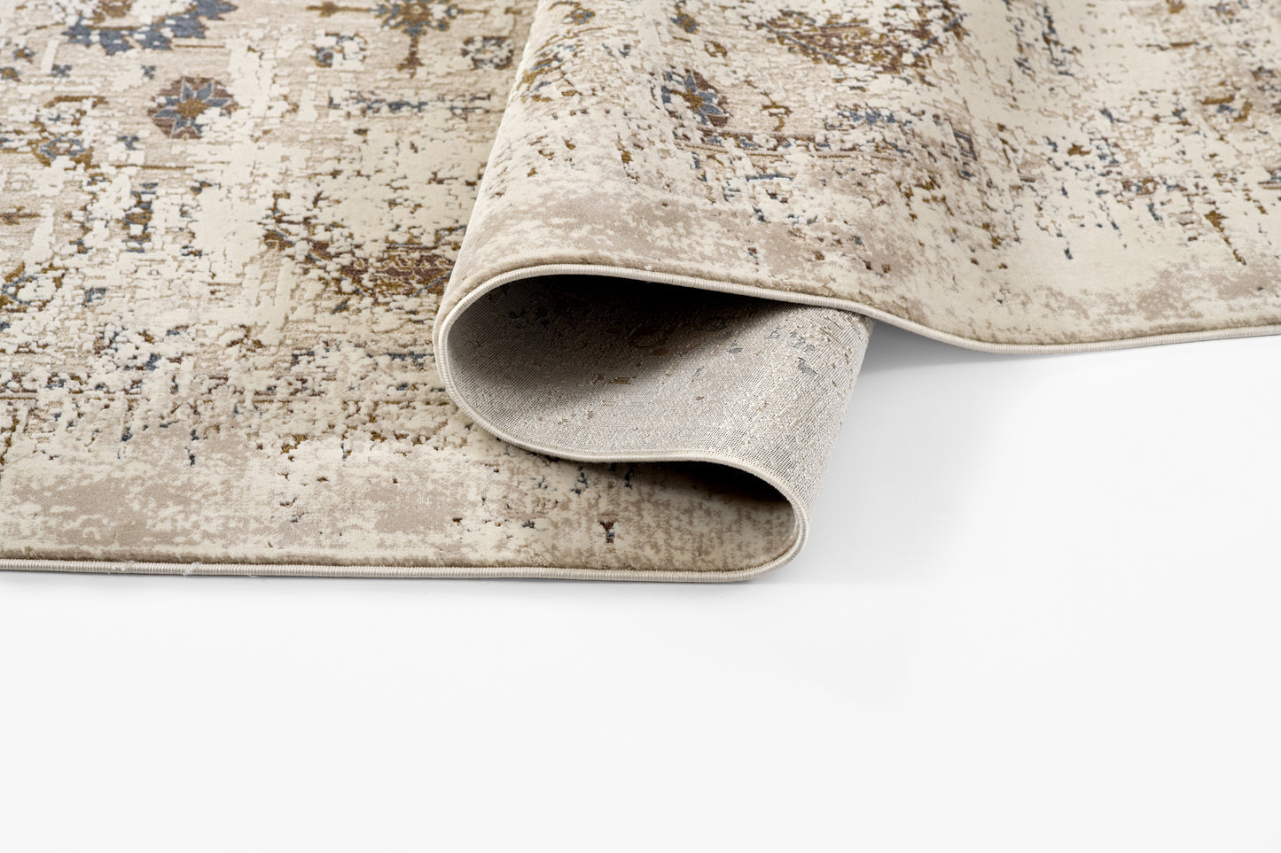 Beige distressed oriental runner rug with blue and brown motifs; rolled edge reveals soft beige underside.